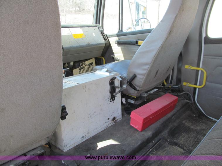image for item D7250 2003 Freightliner FL80 Crew Cab tandem axle boom truck