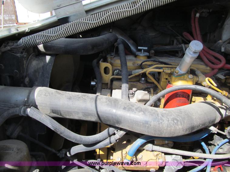 image for item D7250 2003 Freightliner FL80 Crew Cab tandem axle boom truck