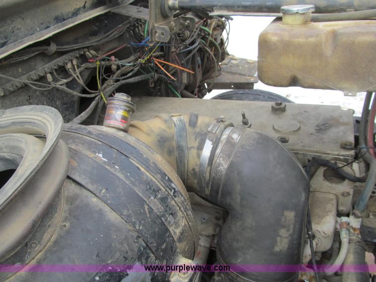 image for item F5961 1986 Ford Aeromax L9000 tri axle dump truck