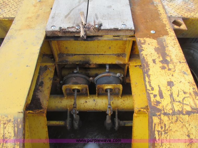 image for item F5972 1991 Rogers triple axle lowboy trailer