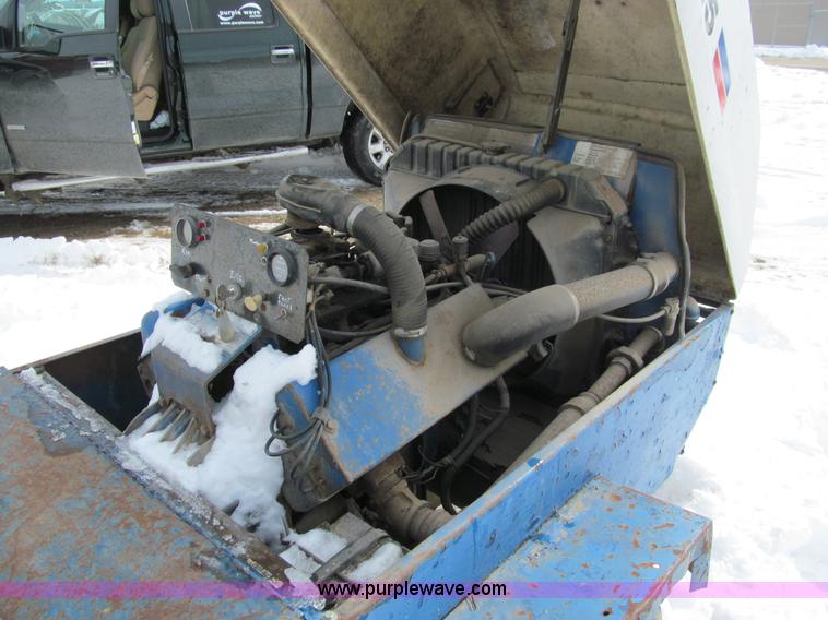 image for item I9846 Air compressor and welder