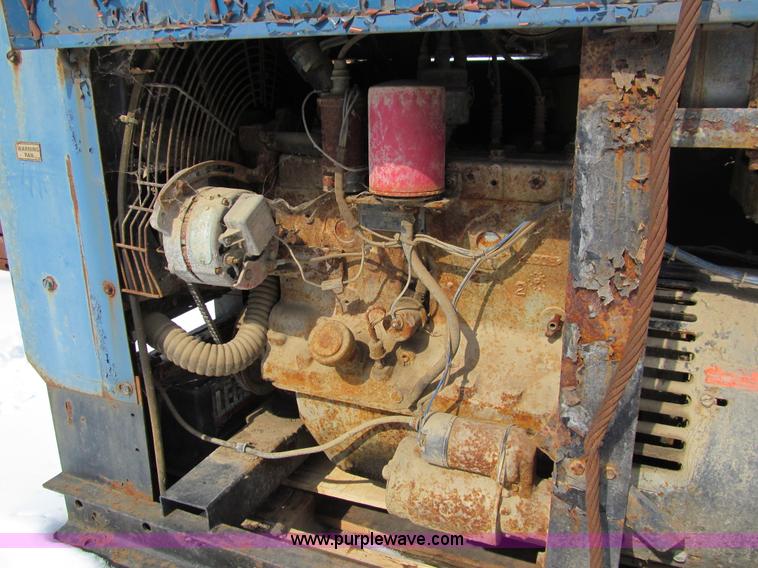 image for item I9846 Air compressor and welder