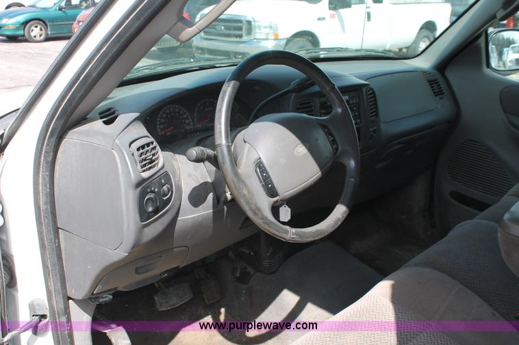 image for item E3297 2002 Ford F150 XLT SuperCab pickup truck