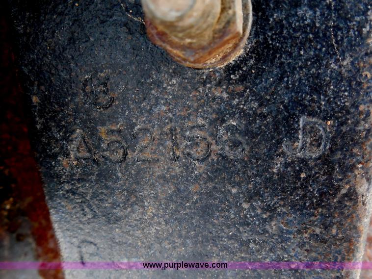 image for item AG9872 (8) John Deere single disk fertilizer openers