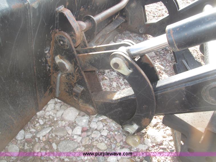 image for item B5431 Buhler Allied 2795 mid mount loader and bale spear