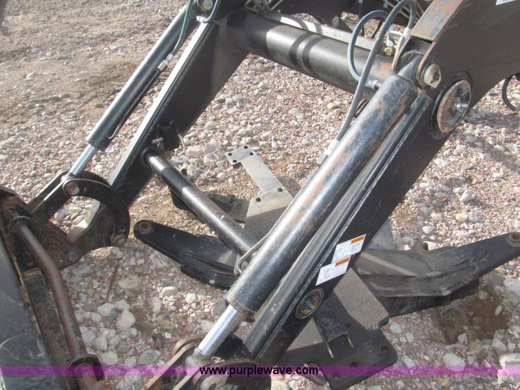 image for item B5431 Buhler Allied 2795 mid mount loader and bale spear