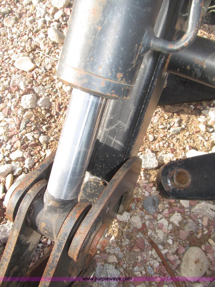 image for item B5431 Buhler Allied 2795 mid mount loader and bale spear