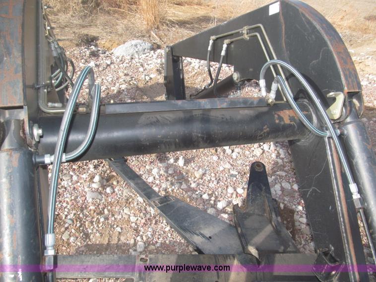 image for item B5431 Buhler Allied 2795 mid mount loader and bale spear