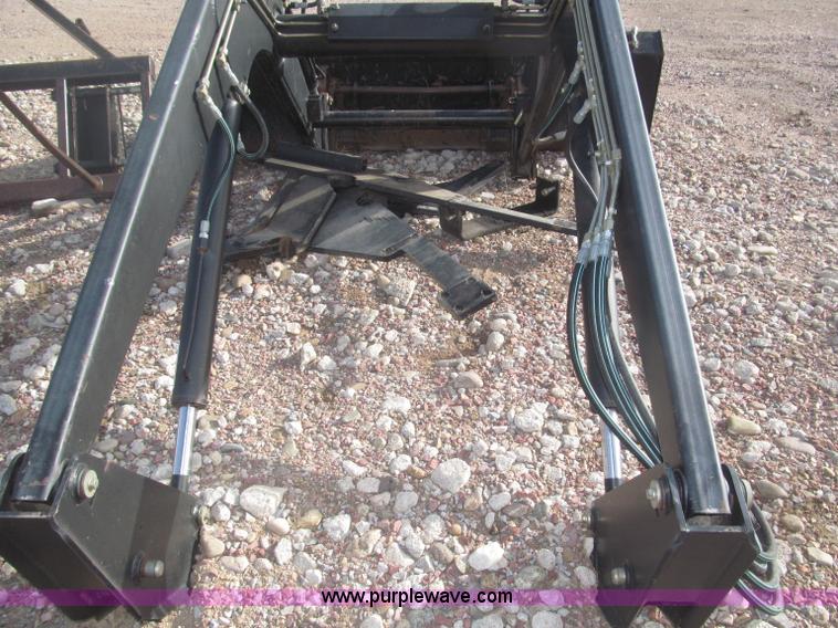 image for item B5431 Buhler Allied 2795 mid mount loader and bale spear