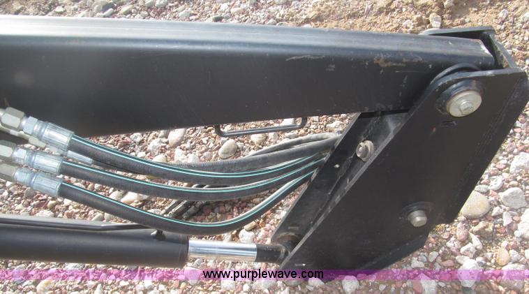 image for item B5431 Buhler Allied 2795 mid mount loader and bale spear