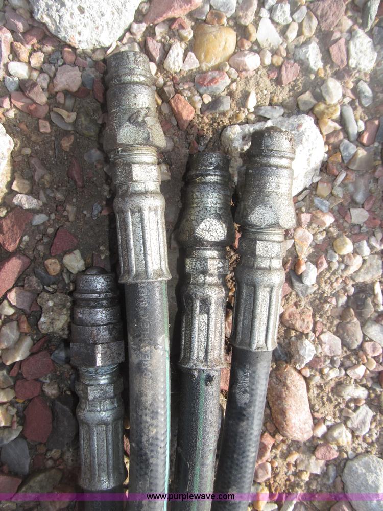 image for item B5431 Buhler Allied 2795 mid mount loader and bale spear