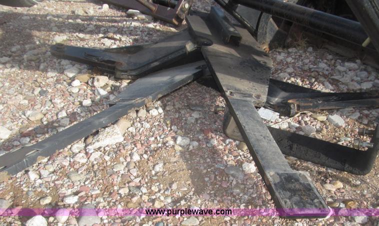 image for item B5431 Buhler Allied 2795 mid mount loader and bale spear