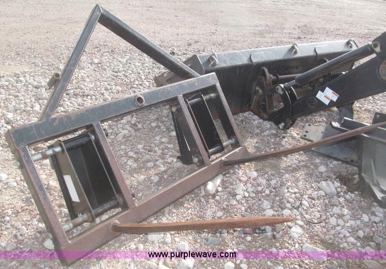 image for item B5431 Buhler Allied 2795 mid mount loader and bale spear