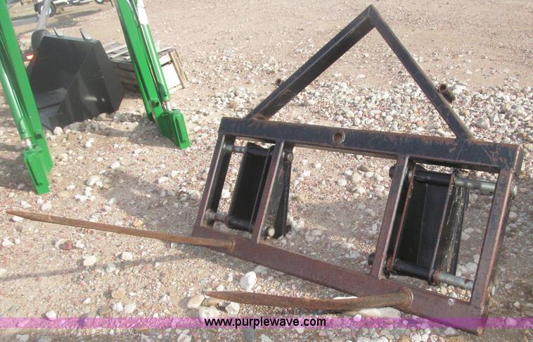 image for item B5431 Buhler Allied 2795 mid mount loader and bale spear