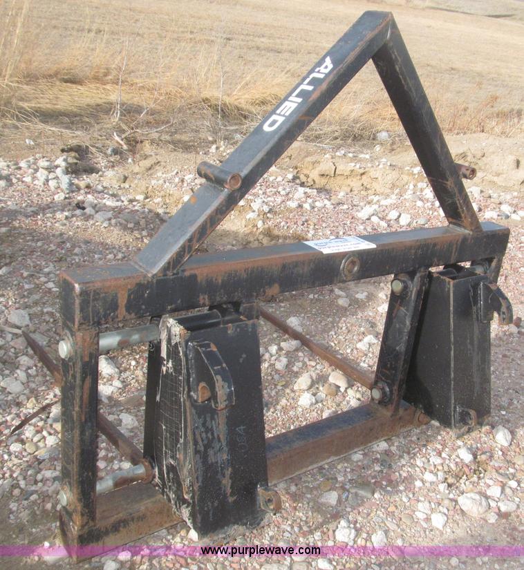 image for item B5431 Buhler Allied 2795 mid mount loader and bale spear