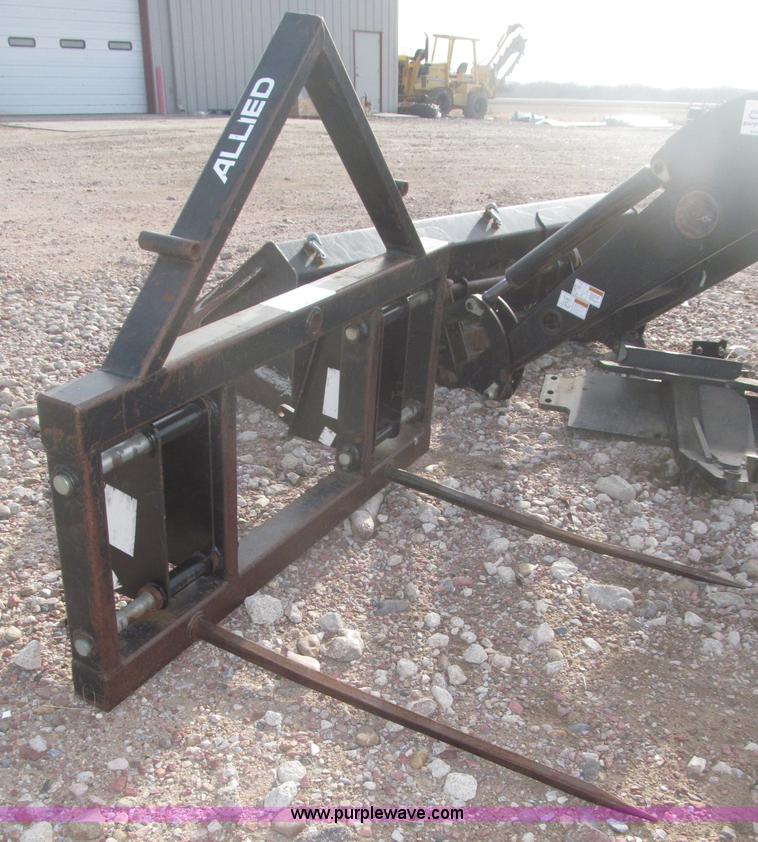 image for item B5431 Buhler Allied 2795 mid mount loader and bale spear