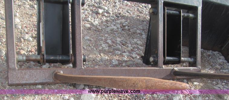 image for item B5431 Buhler Allied 2795 mid mount loader and bale spear