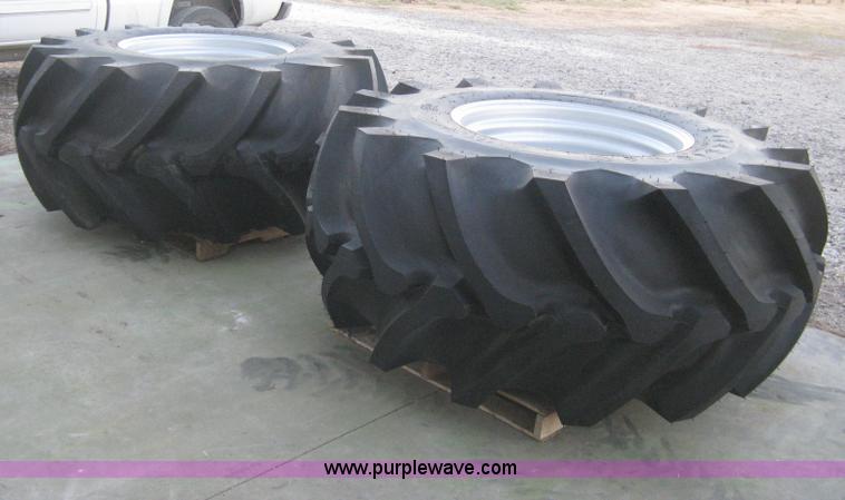 image for item C1009 (2) Firestone Champion Spade Grip 30.5L-32 tires