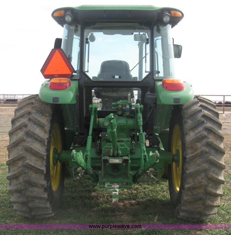 image for item E3358 2009 John Deere 6100D MFWD tractor