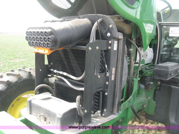 image for item E3358 2009 John Deere 6100D MFWD tractor