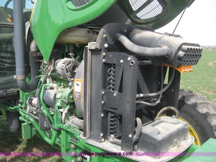 image for item E3358 2009 John Deere 6100D MFWD tractor