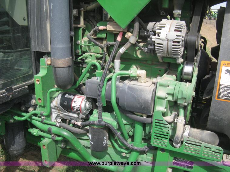 image for item E3358 2009 John Deere 6100D MFWD tractor