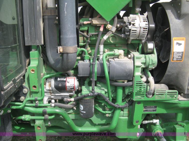 image for item E3358 2009 John Deere 6100D MFWD tractor