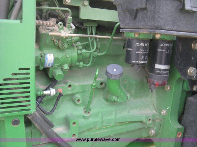 image for item E3358 2009 John Deere 6100D MFWD tractor