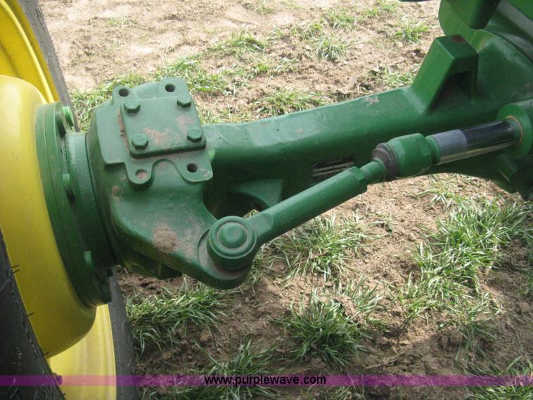 image for item E3358 2009 John Deere 6100D MFWD tractor