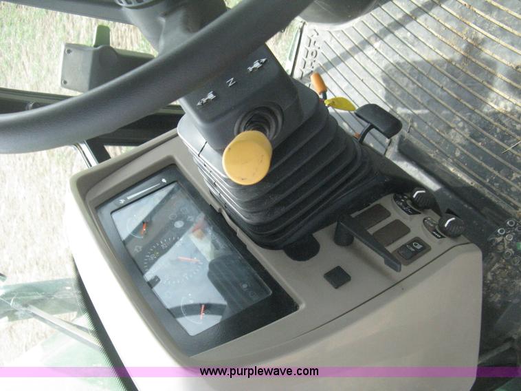 image for item E3358 2009 John Deere 6100D MFWD tractor