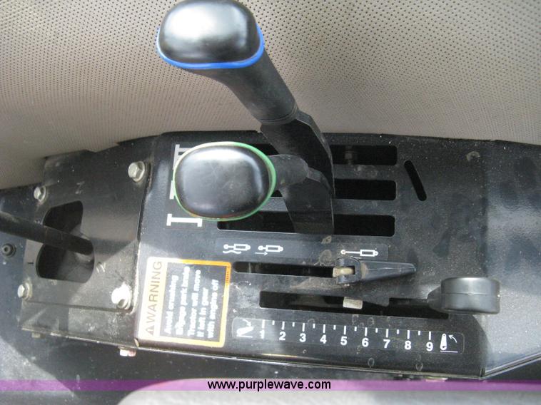 image for item E3358 2009 John Deere 6100D MFWD tractor