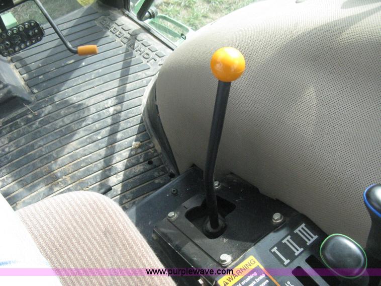 image for item E3358 2009 John Deere 6100D MFWD tractor