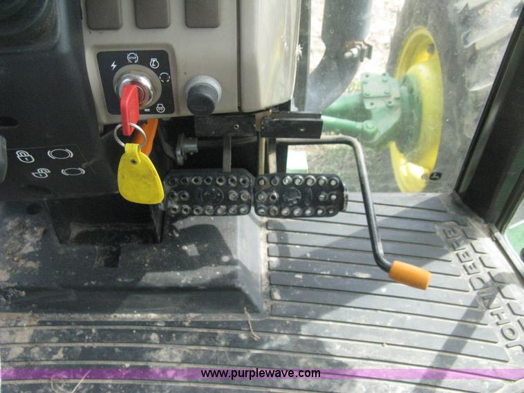 image for item E3358 2009 John Deere 6100D MFWD tractor