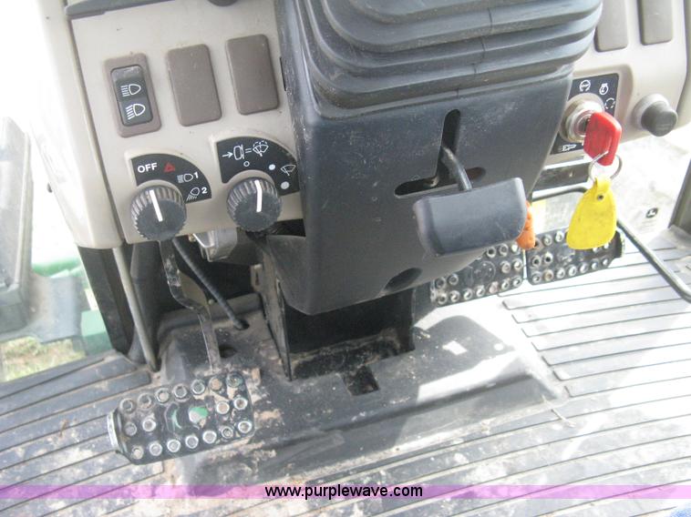 image for item E3358 2009 John Deere 6100D MFWD tractor