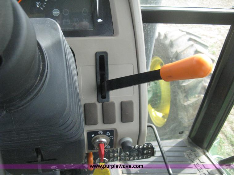 image for item E3358 2009 John Deere 6100D MFWD tractor