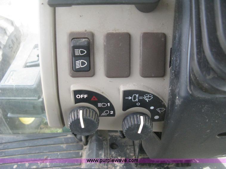 image for item E3358 2009 John Deere 6100D MFWD tractor