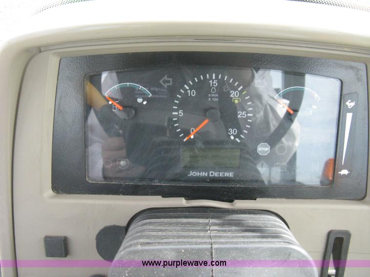 image for item E3358 2009 John Deere 6100D MFWD tractor