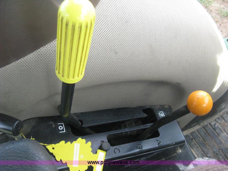 image for item E3358 2009 John Deere 6100D MFWD tractor