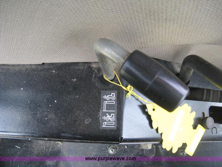 image for item E3358 2009 John Deere 6100D MFWD tractor