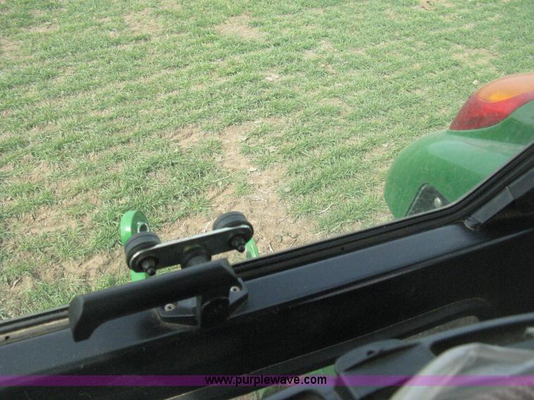 image for item E3358 2009 John Deere 6100D MFWD tractor