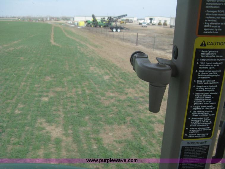 image for item E3358 2009 John Deere 6100D MFWD tractor