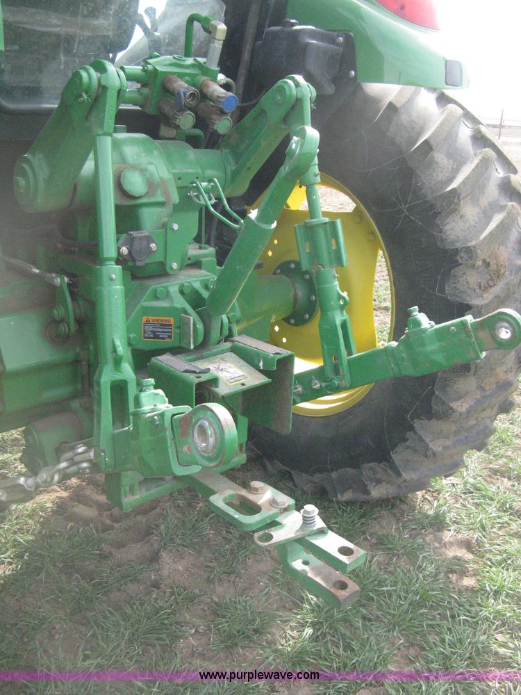 image for item E3358 2009 John Deere 6100D MFWD tractor