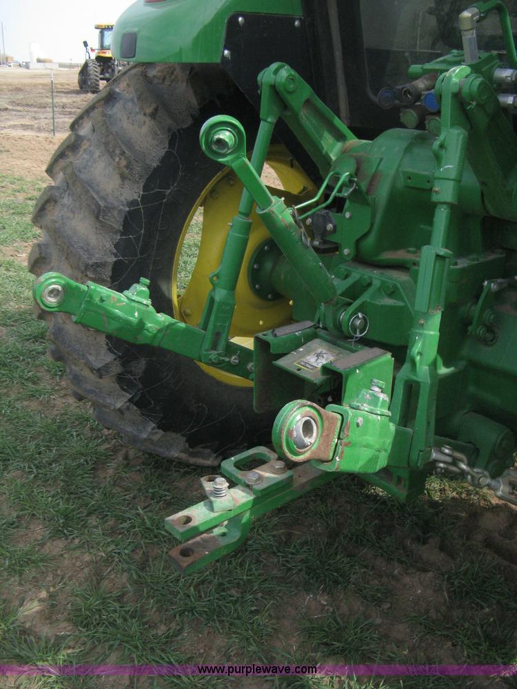 image for item E3358 2009 John Deere 6100D MFWD tractor