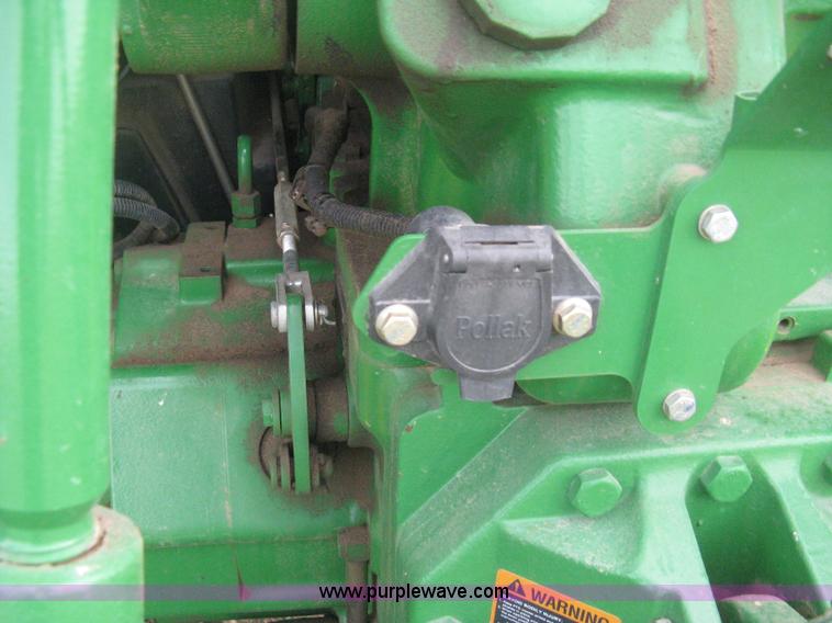 image for item E3358 2009 John Deere 6100D MFWD tractor