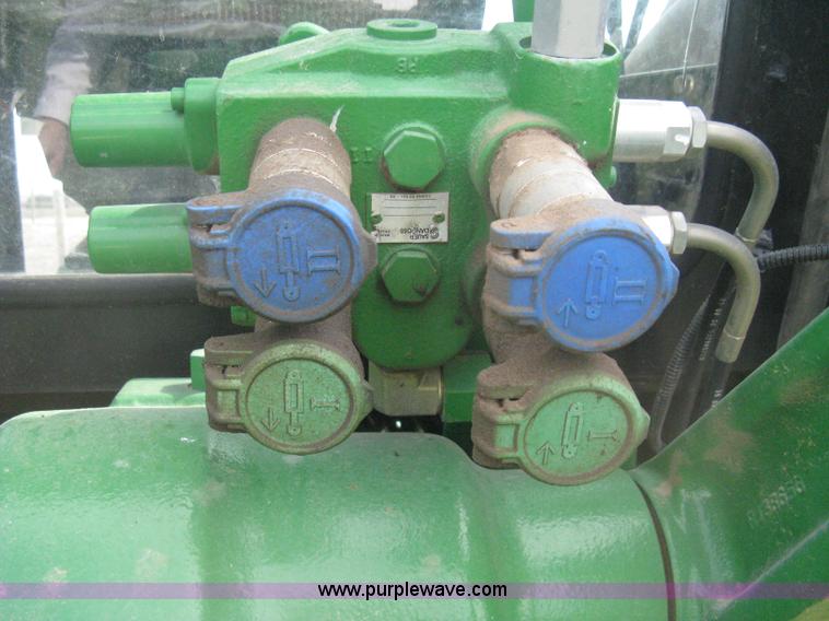 image for item E3358 2009 John Deere 6100D MFWD tractor