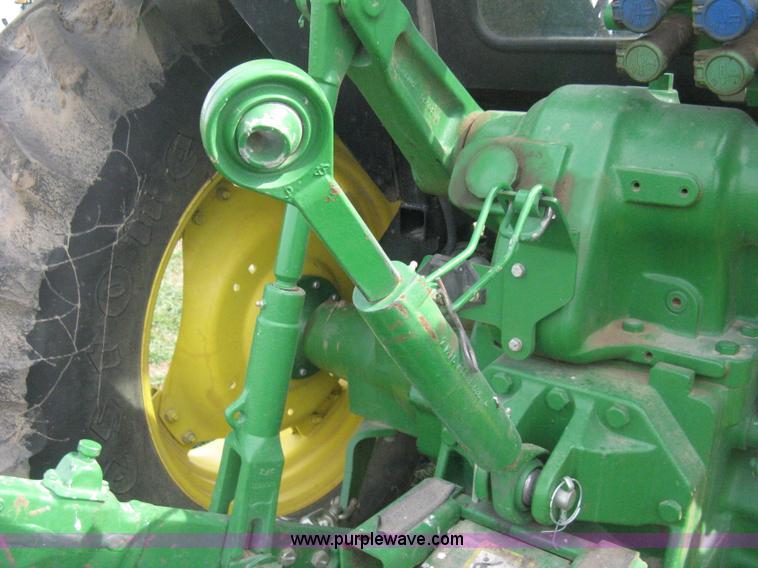 image for item E3358 2009 John Deere 6100D MFWD tractor