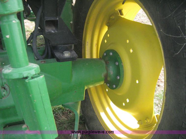 image for item E3358 2009 John Deere 6100D MFWD tractor