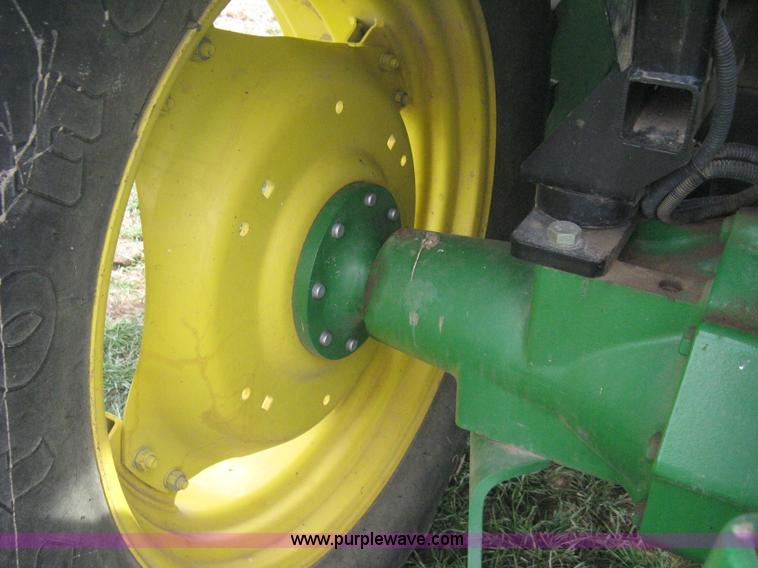 image for item E3358 2009 John Deere 6100D MFWD tractor