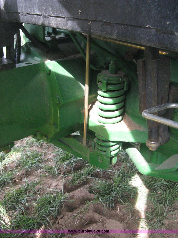 image for item E3358 2009 John Deere 6100D MFWD tractor