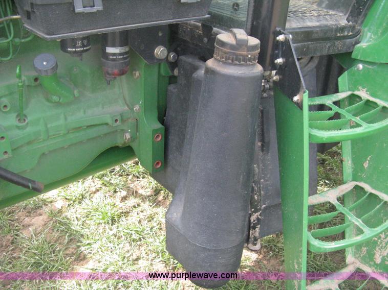 image for item E3358 2009 John Deere 6100D MFWD tractor